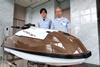 Tomoki Ito (left) and Kenjiro Fujii lead Yamaha’s efforts to develop FRP as a boat building material