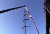 Perseus^3 75.8m carbon fibre mast on a crane