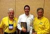 ValvTect's Paul Craufurd and president Jerry Nessenson present the 2011 award to Ray Fernandez of Br