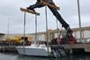 5. 35 Catamaran gets lifted from the RoRo into Australian waters - stern 