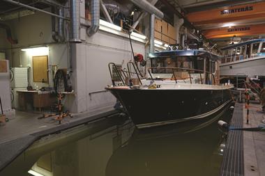 Boats are floated in a pool to check the inlets
