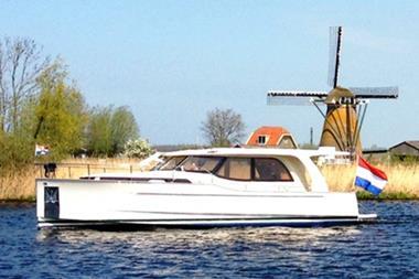 Dutch-motorboat-on-lake-in-South-Holland-Netherlands