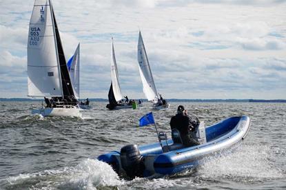 Quantum's new Director of Western US Sales, Jeff Thorpe, provides coaching for J_105 sailors at a recent North American Championship