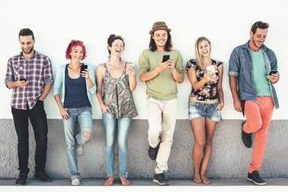 vecteezy_group-of-friends-watching-on-their-smart-mobile-phones_39902542