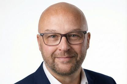 SAY Carbon Stan Holders Headshot