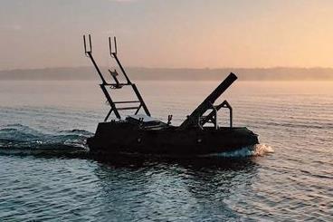 One of Saronic Technologies’ autonomous boat testbeds maneuvers in the Gulf of Mexico neat Galveston, Texas