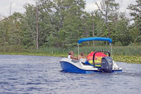 Boat going tubing