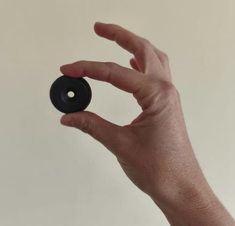 The RFID chip is enclosed in a hardened case, allowing it to be inserted into the composite fabric of a hull as it is being built, even when being baked in an autoclave. There is no battery involved - the device is activated by the radio energy from the scanner.