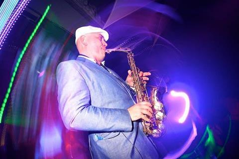 Saxophonist at party_3-2